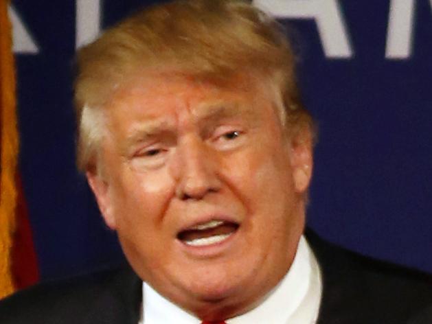 FILE - In this Dec. 7, 2015 file photo, Republican presidential candidate, businessman Donald Trump speaks aboard the aircraft carrier USS Yorktown in Mt. Pleasant, S.C. (AP Photo/Mic Smith, File)