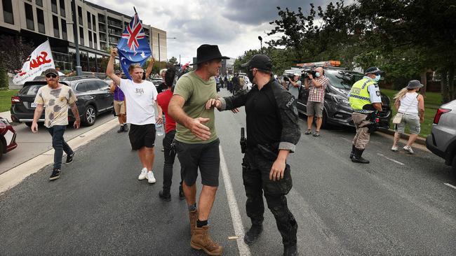 Protesters yell abuse at Prime Minister Scott Morrison as he departs the National Press Club in Canberra on Tuesday. Picture: NCA/Gary Ramage