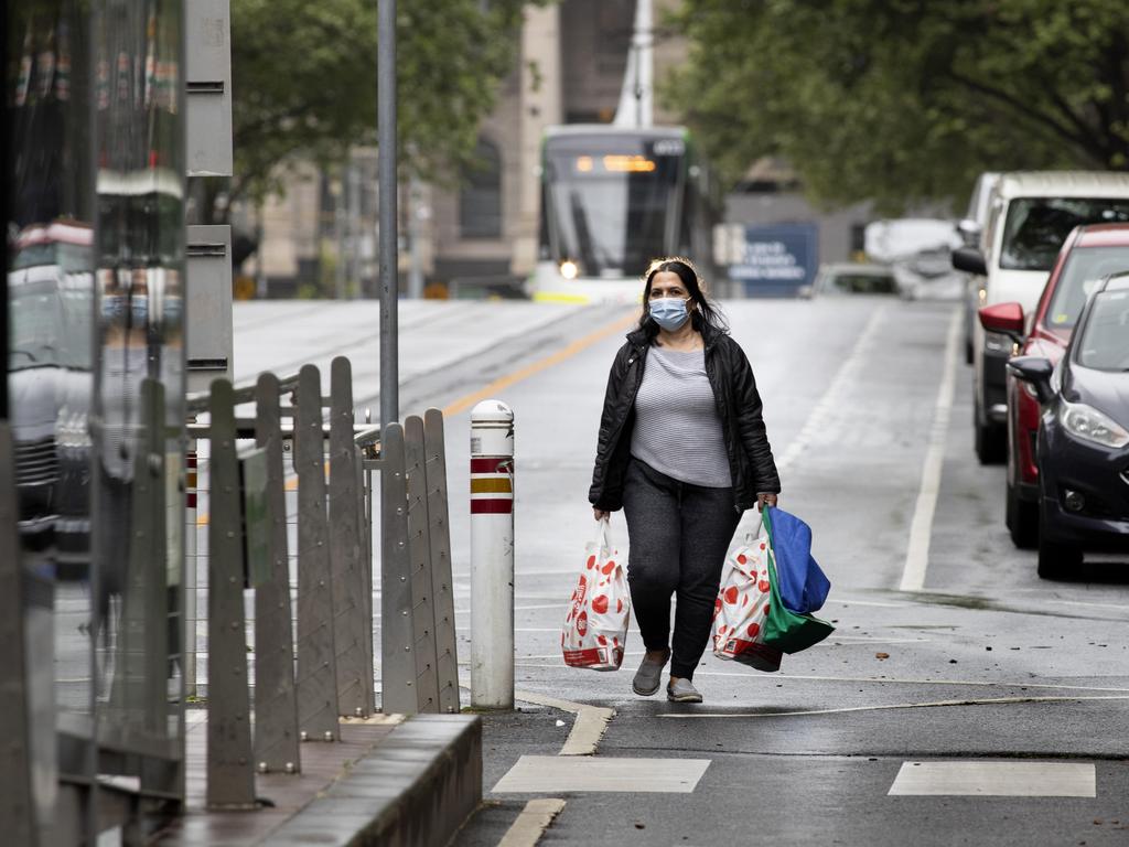 A woman walks along Bourke Street in the CBD. Picture: NCA NewsWire / David Geraghty