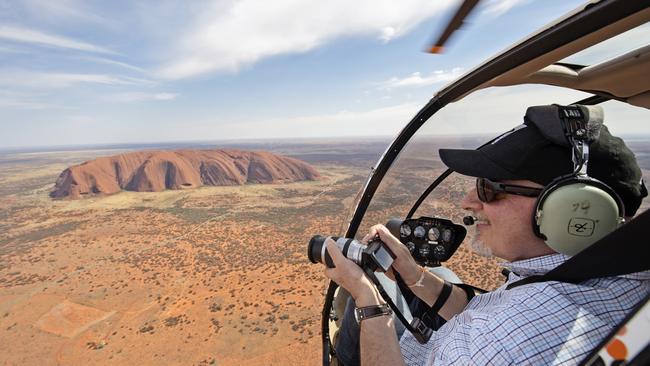 One of the best ways to view Uluru is from a helicopter.