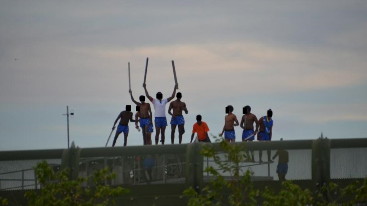 Youths rioting on top of a building at Cleveland Youth Detention Centre in 2016. Picture: DOMANII CAMERON