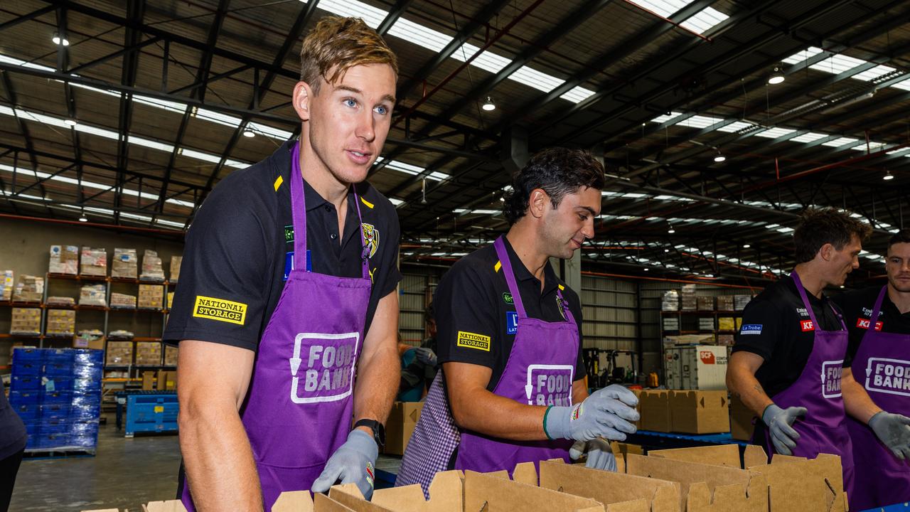 Tom Lynch and Tim Taranto launch Richmond and Collingwood Charity Shield game to raise money for Foodbank