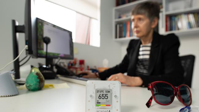 Lidia Morawska in her office at QUT, with the carbon dioxide monitor. Picture: Anthony Weate