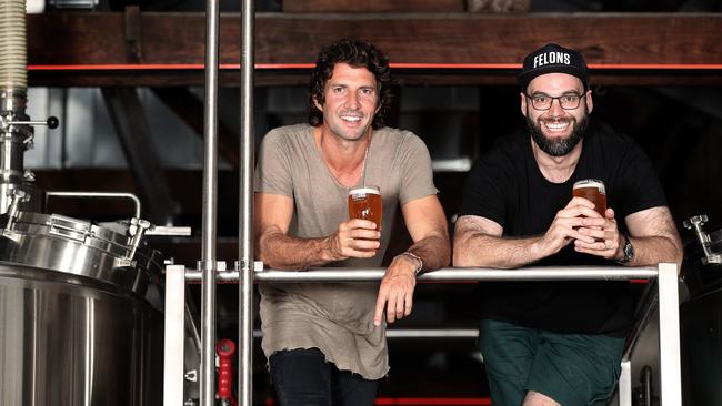 Director of Howard Smith Wharves Adam Flaskas with head brewer of Felons Brewing Co. Tom Champion. Picture: Tara Croser