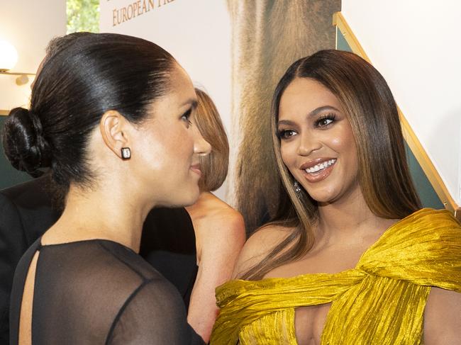 LONDON, ENGLAND - JULY 14: Meghan, Duchess of Sussex (L) meets cast and crew, including Beyonce Knowles-Carter (C) Jay-Z (R) as she attends the European Premiere of Disney's "The Lion King" at Odeon Luxe Leicester Square on July 14, 2019 in London, England.  (Photo by Niklas Halle'n-WPA Pool/Getty Images)