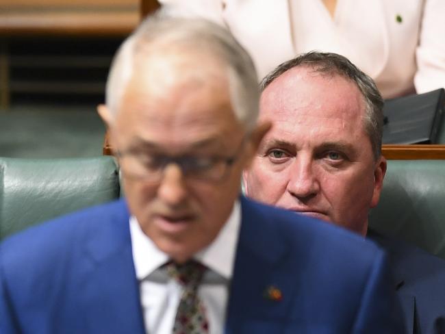 Australian Deputy Prime Minister Barnaby Joyce listens to Australian Prime Minister Malcolm Turnbull speak on the Closing the Gap report in the House of Representatives. Picture: AAP