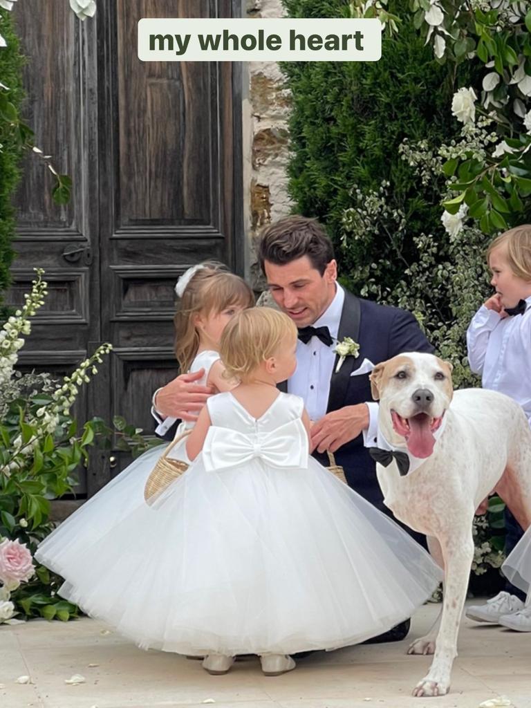 The Bachelor couple enlisted their daughters as flower girls.