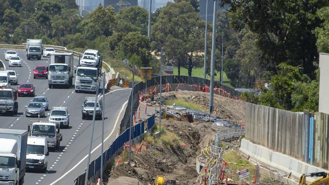 A mound of soil lies behind barricades running along the West Gate Freeway. Picture Jay Town