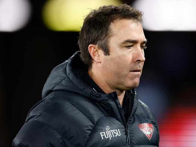 MELBOURNE, AUSTRALIA - JULY 27: Brad Scott, Senior Coach of the Bombers looks on during the 2024 AFL Round 20 match between the St Kilda Saints and the Essendon Bombers at Marvel Stadium on July 27, 2024 in Melbourne, Australia. (Photo by Michael Willson/AFL Photos via Getty Images)