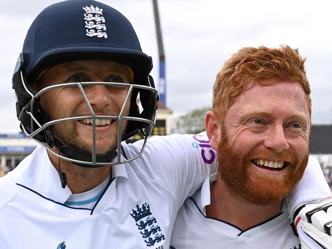 BIRMINGHAM, ENGLAND - JULY 05: Joe Root and Jonathan Bairstow of England celebrate winning the Fifth LV= Insurance Test Match between England and India at Edgbaston on July 05, 2022 in Birmingham, England. (Photo by Gareth Copley/Getty Images)