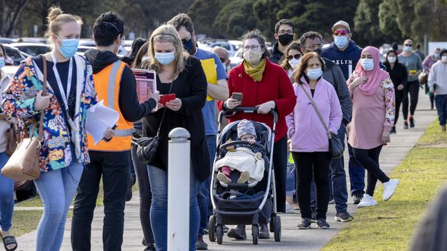 Crowds queue outside the vaccination centre at Sandown Racecourse before the gap between jabs is extended. Picture: NCA NewsWire/David Geraghty