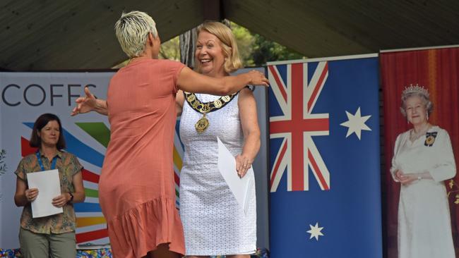 Coffs Harbour mayor Denise Knight welcomed 60 new Aussies from 19 countries with hugs instead of handshakes at Australia Day celebrations pre Covid.