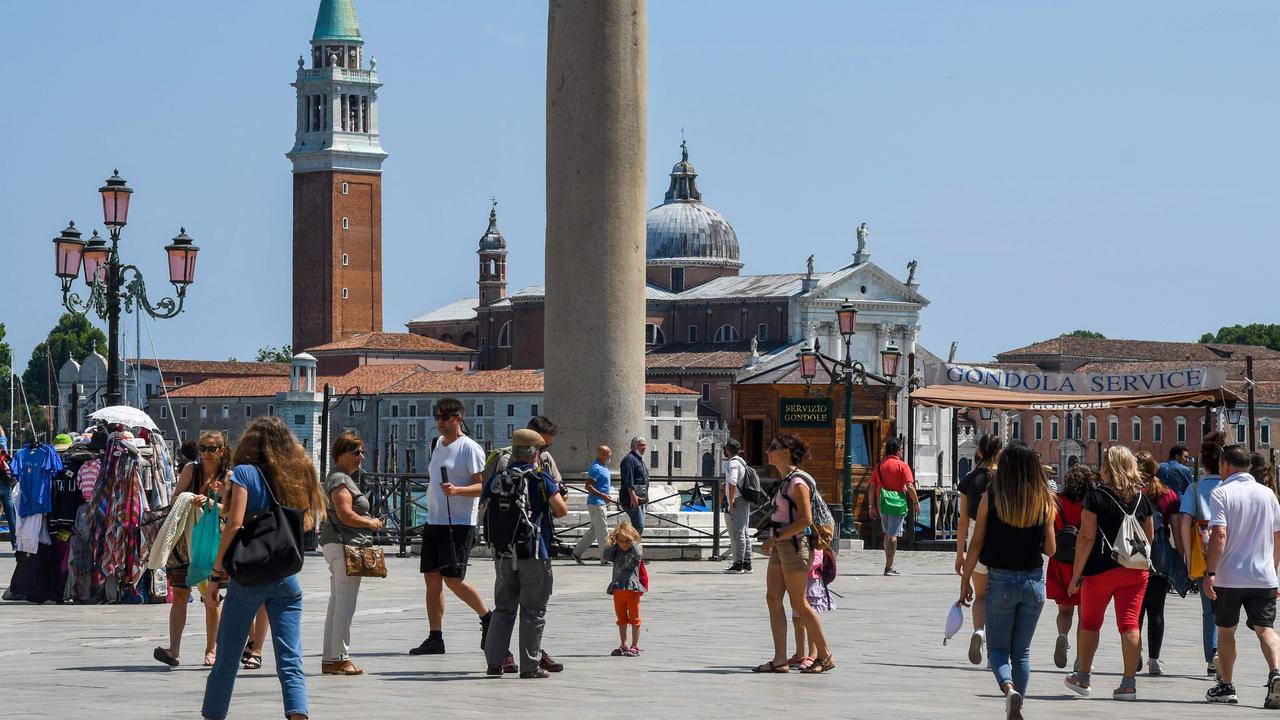 Italy is coming out of lockdown and tourists are returning to hotspots like Venice. Andrea Pattaro / AFP