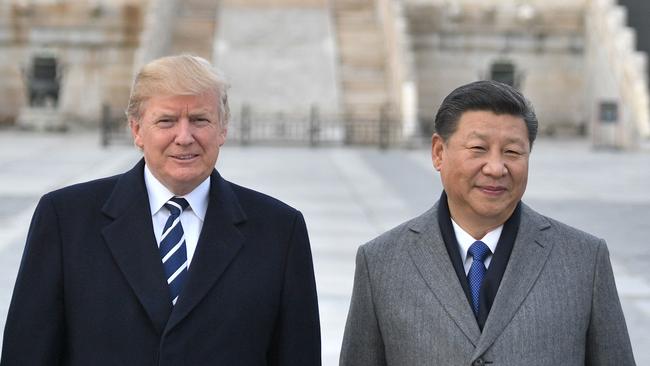 Donald Trump and Xi Jinping pose in the Forbidden City in Beijing in 2017. Picture: AFP