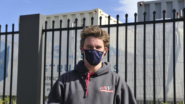 Coffs Harbour Shoreline worker Noah Ross leaves the site after being tested. Photo: Tim Jarrett