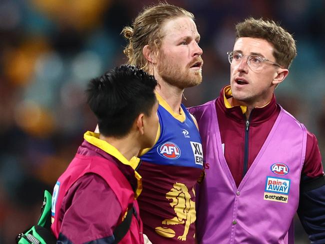 BRISBANE, AUSTRALIA - JULY 23: Daniel Rich of the Lions leaves the ground during the round 19 AFL match between the Brisbane Lions and the Gold Coast Suns at The Gabba on July 23, 2022 in Brisbane, Australia. (Photo by Chris Hyde/AFL Photos/Getty Images)