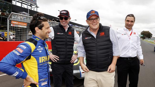 ***DAILY TELEGRAPH EXCLUSIVE*** SATURDAY TELEGRAPH. DECEMBER 5, 2021. Pictured is Supercar Driver Michael Caruso, Premier Dominic Perrottet, Prime Minister Scott Morrison and Supercars CEO Sean Seamer after doing a lap around the track while they are visiting Mount Panorama today at the Repco Bathurst 1000. Picture: Tim Hunter.