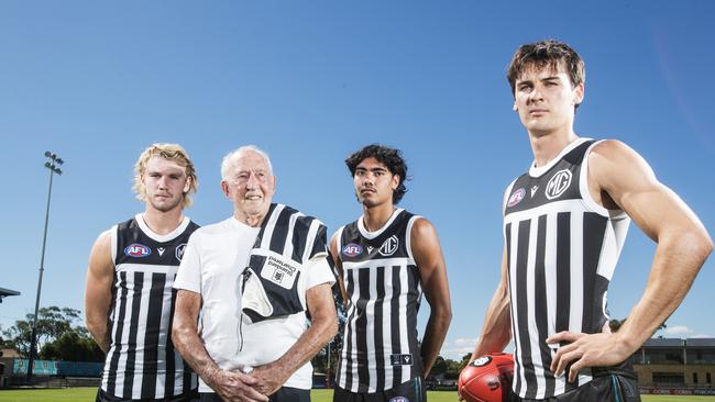 Port Legend John "Jack" Cahill with players Jason Horne-Francis, Jase Burgoyne and Connor Rozee. Picture Simon Cross