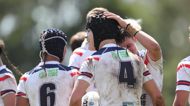 The Roosters celebrate Koby Houghton’s try. Picture: Sue Graham