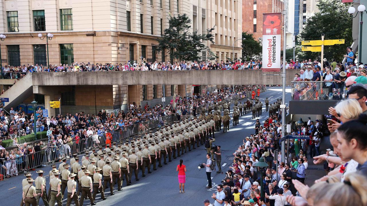 Large crowds around ANZAC Square watching the ANZAC Day parade in 2019. Photographer: Liam Kidston.