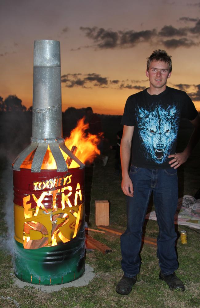 Kris Spindler with his Fire Drum at the Killarney Bonfire and Fire Drum Night on Saturday, July 27, 2013. Photo: John Towells / Warwick Daily News