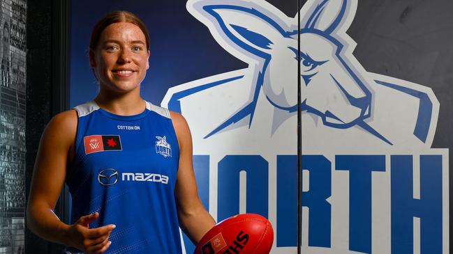 MELBOURNE, AUSTRALIA - NOVEMBER 28: Mia King of the Kangaroos poses during a North Melbourne Kangaroos AFLW media opportunity at Arden Street Ground on November 28, 2023 in Melbourne, Australia. (Photo by Morgan Hancock/Getty Images)