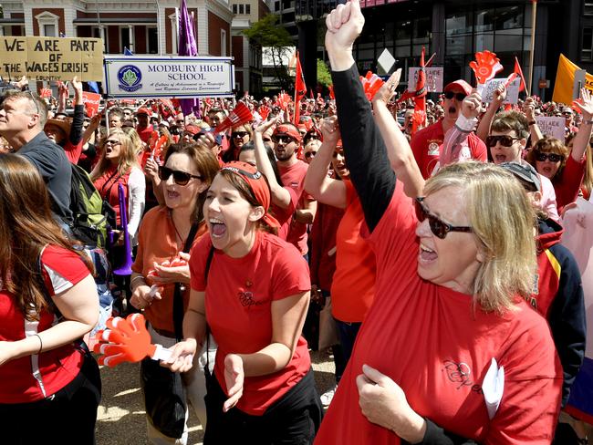 South Australian public school teachers are seen protesting at Flinders Street, in Adelaide, Thursday, November 29, 2018. SA public school teachers are striking for half a day over stalled enterprise agreement negotiations with the SA State Liberal Government. (AAP Image/Sam Wundke) NO ARCHIVING