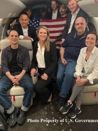 The hostages, including Evan Gershkovich (bottom left) were seen smiling in the first official photos of the trio since their release. Picture: Supplied