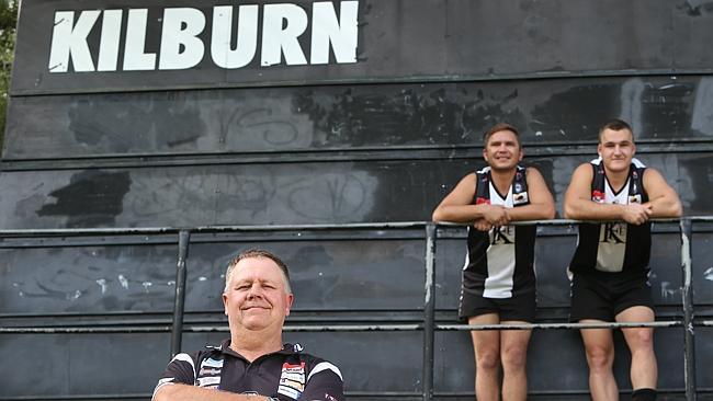 Kilburn Football Club treasurer Danny Parks with A grade Division 3 players Jamin Tripp and Cody Gill. Picture: Tait Schmaal