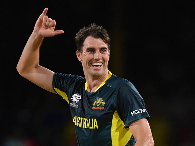 ST VINCENT, SAINT VINCENT AND THE GRENADINES - JUNE 22: Pat Cummins of Australia celebrates after dismissing Gulbadin Naib of Afghanistan (not pictured) for his hat trick during the ICC Men's T20 Cricket World Cup West Indies & USA 2024 Super Eight match between Afghanistan and Australia at Arnos Vale Ground on June 22, 2024 in St Vincent, Saint Vincent and The Grenadines. (Photo by Gareth Copley/Getty Images)