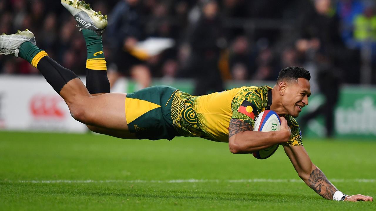 Folau in 2018 after entering into his new Rugby Australia contract. Picture: Ben Stanstall/AFP