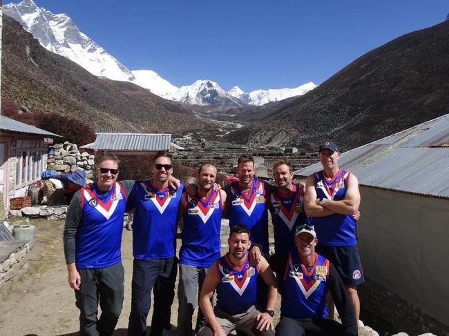 Mitch Herbison, Josh McCann, Kent Agg, Tim Sherman, Scott McLean, Jarrod Westwood, Glen Wallace and James Garvey reached Mt Everest Base Camp wearing South Barwon colours. Picture: Contributed