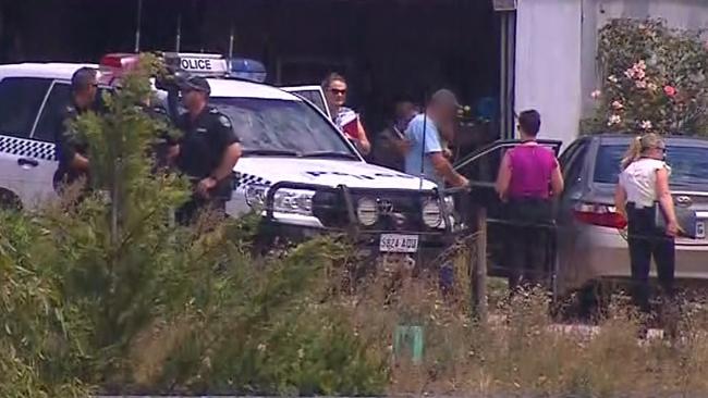 Gene Bristow is taken into custody at his farm. Picture: Nine News