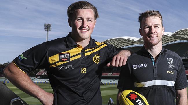 Former Glenelg young gun Will Gould, pictured with Port Adelaide star Robbie Gray, is taking his talents to the Swans. Picture: Sarah Reed