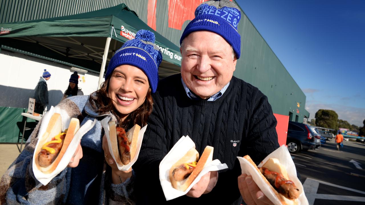 Peter Hitchener and Bonnie Anderson at Bunnings in Box Hill. Snags have become part of the Bunnings experience. Picture: Andrew Henshaw