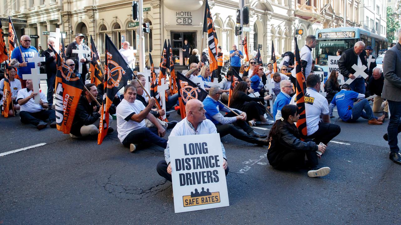 TWU members, transport workers and councillors blocked traffic to hold a vigil in the Sydney’s CBD. Picture: NCA NewsWire/ Nikki Short