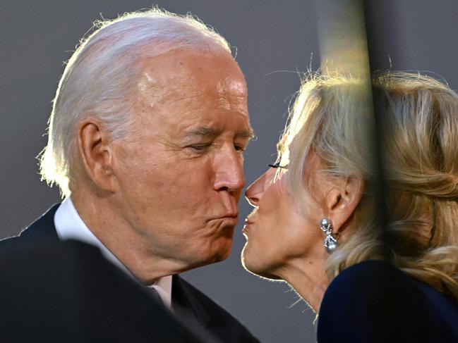 US First Lady Jill Biden kisses US President Joe Biden as they host a reception at the Metropolitan Museum of Art on the sidelines of the 79th Session of the United Nations General Assembly in New York on September 25, 2024. (Photo by ANDREW CABALLERO-REYNOLDS / AFP)