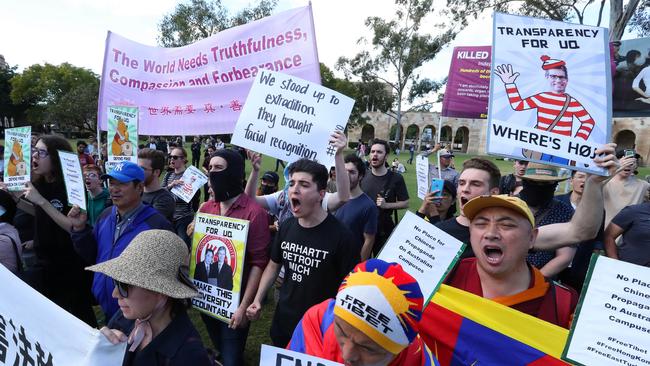 Drew Pavlou (centre) and other University of Queensland students protest against the uni's China-aligned Confucius Institute. Picture: Liam Kidston