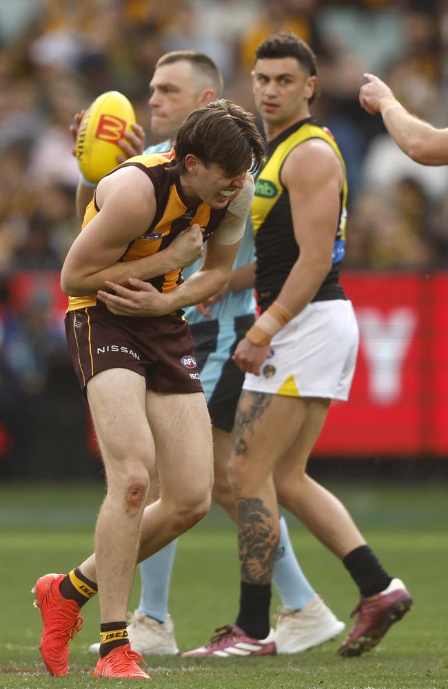 It took some time for the tough Hawk to leave the field. Picture: Darrian Traynor/Getty Images