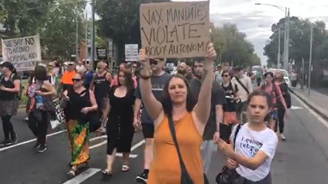 Crowds walk in the ‘Millions march against mandatory COVID vaccinations’ rally. Picture: David Geraghty