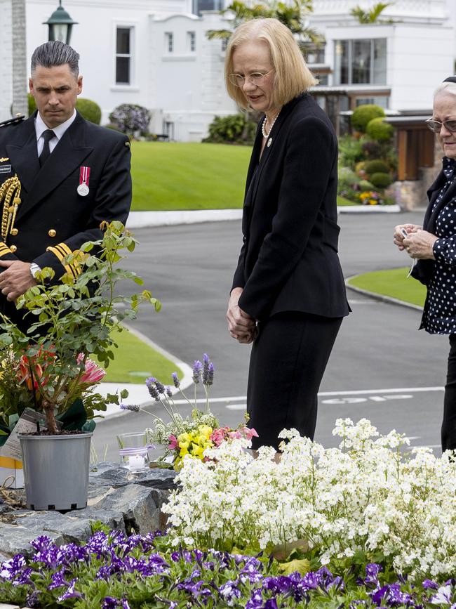 Queensland Governor Dr Jeannette Young with flowers laid outside Government House. NewsWire / Sarah Marshall