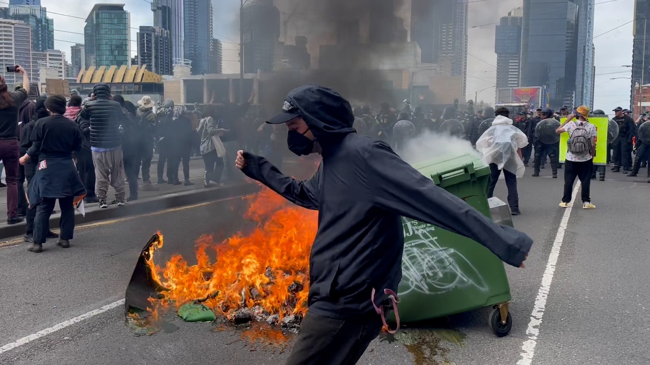 Fires burn in Melbourne during anti-war protest