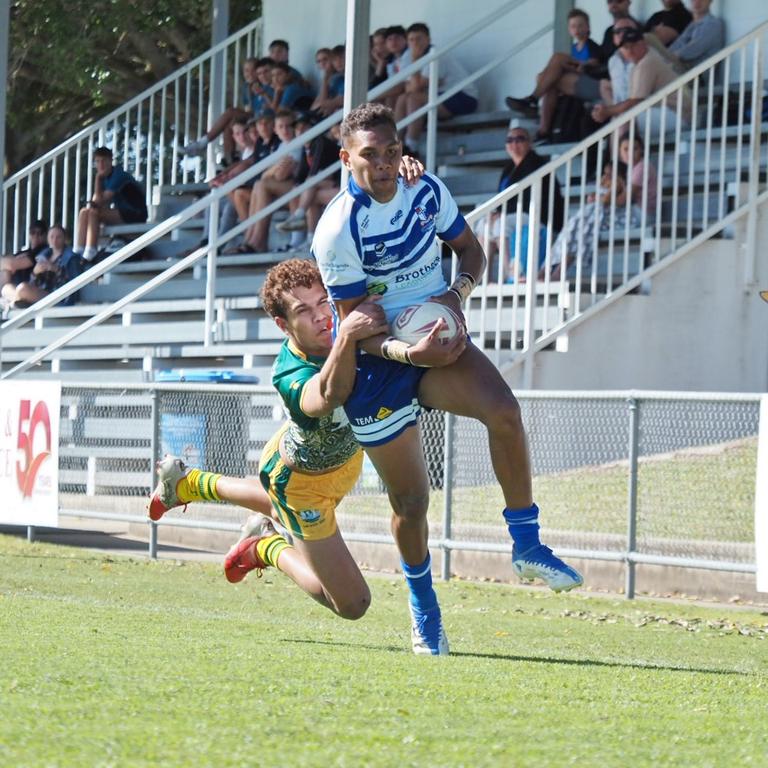 A St Brendan's College player tackles an Ignatius Park College player in the Phil Hall Cup semi-final in Mackay on Wednesday, August 24, 2022.
