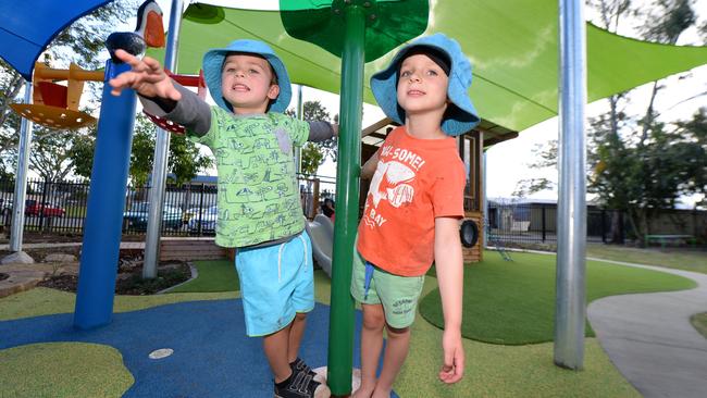 Jaxon Cosgrove and Cooper Kranski enjoying the playground at Elfin House in years gone by. Photo: Chris Ison / The Morning Bulletin