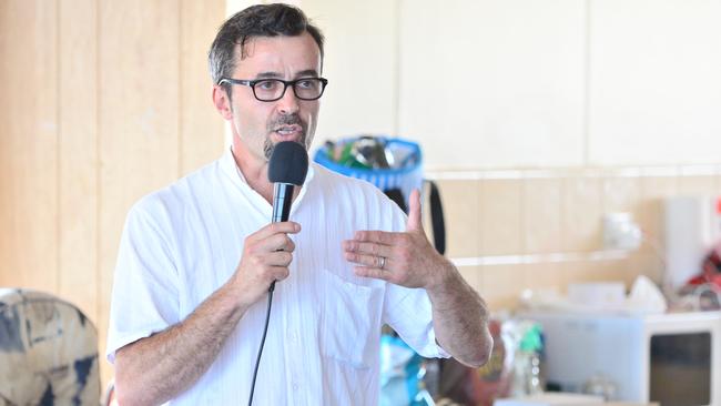 Organiser Willem Popp speaks to angry residents at a meeting to protest the State Government’s proposed sky rail. Picture: Eugene Hyland