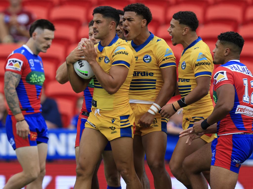 Parramatta star Dylan Brown celebrates a try against the Knights. Picture: NRL