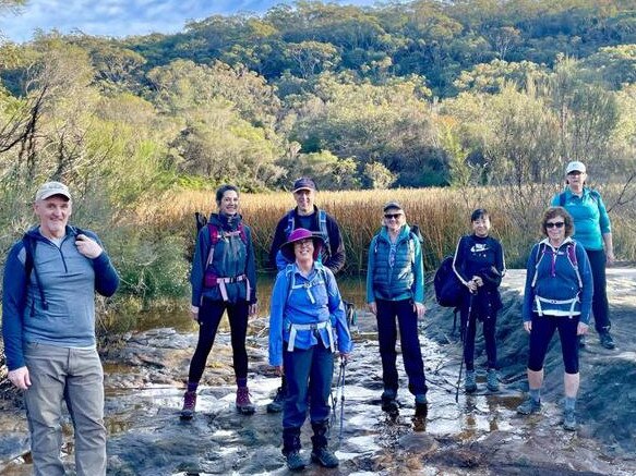 Sonia Wray (purple hat) and HIKEFit group at Belrose in Garigal National Park. Image Supplied.