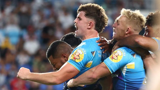 GOLD COAST, AUSTRALIA - APRIL 09: Toby Sexton  of the Titans celebrates a tryduring the round six NRL match between Gold Coast Titans and St George Illawarra Dragons at Cbus Super Stadium on April 09, 2023 in Gold Coast, Australia. (Photo by Chris Hyde/Getty Images)