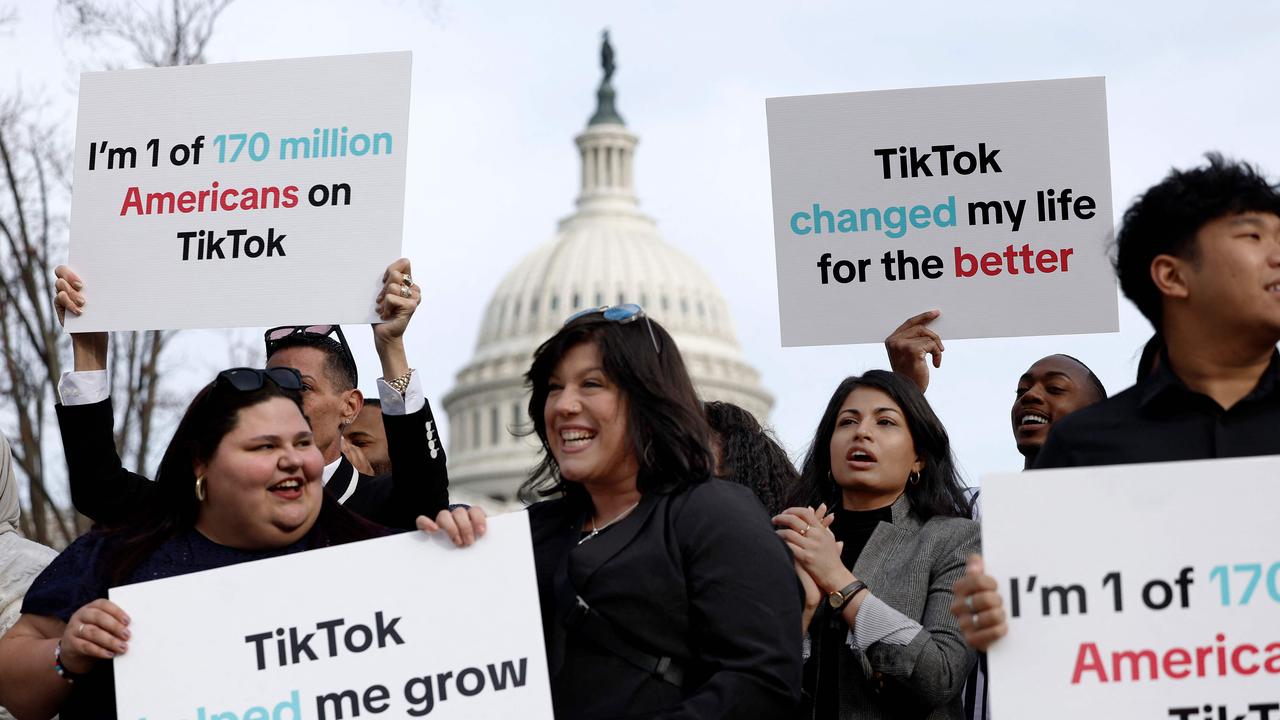 Participants hold signs in support of TikTok outside the US Capitol Building on March 13, 2024 in Washington, DC. Picture: Anna Moneymaker