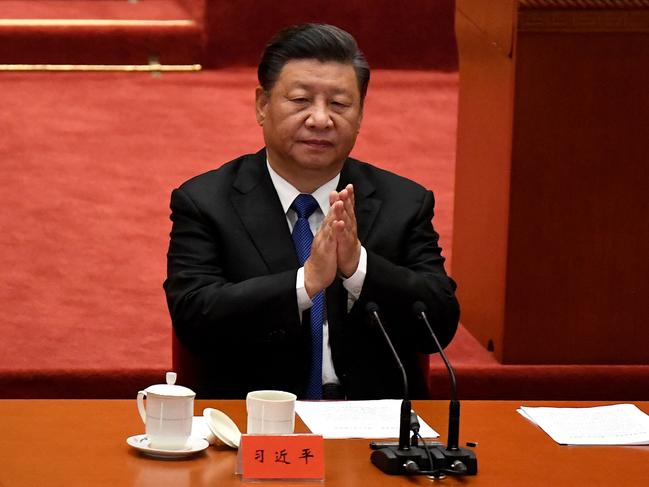 TOPSHOT - Chinese President Xi Jinping attends the commemoration of the 110th anniversary of the Xinhai Revolution which overthrew the Qing Dynasty and led to the founding of the Republic of China, at the Great Hall of the People in Beijing on October 9, 2021. (Photo by Noel Celis / AFP)